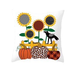 Detail view of Thanksgiving pillowcase featuring sunflowers, pumpkins and bird patterns