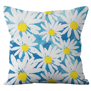 Square pillowcase featuring white daisies on a blue watercolor background texture
