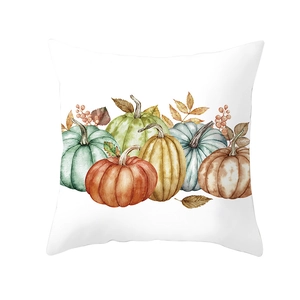 Detailed close-up of watercolor pumpkin and autumn leaf print on white square cushion cover