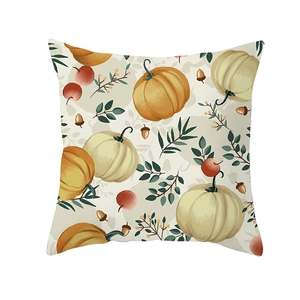 Detailed view of autumn harvest pillow cover featuring colorful pumpkins and acorns