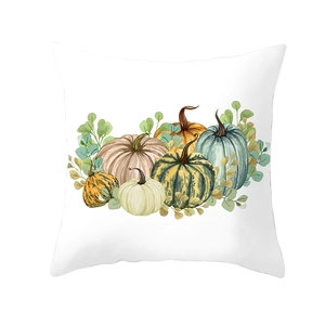 Detail of white square pillow cover with watercolor pumpkins and green leaves for Fall