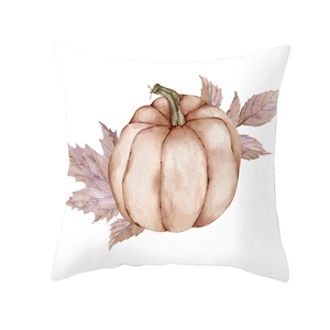 Close-up of white throw pillowcase with watercolor pumpkin and autumn leaves design