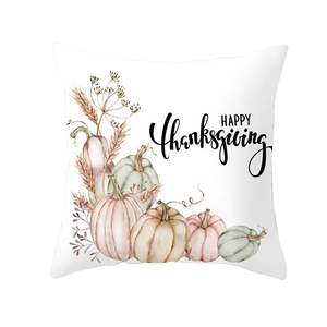 Detail of Happy Thanksgiving throw pillow case featuring watercolor pumpkins and wheat