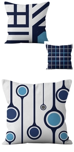 Detail showing plush geometric throw pillow covers in blue and grey abstract patterns