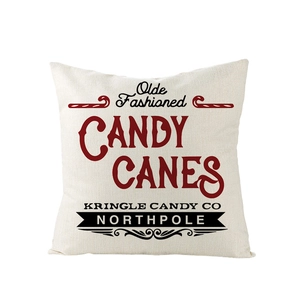 Détail de la housse de coussin en lin avec imprimé de Noël vintage Candy Canes