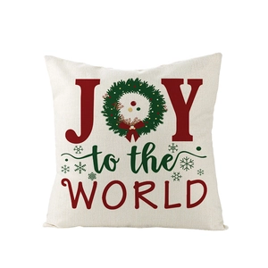 Housse de coussin de Noël Joy to the World en lin avec couronne festive chic