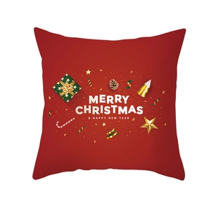 Detail of red Christmas pillowcase with Merry Christmas text and festive gift box icons