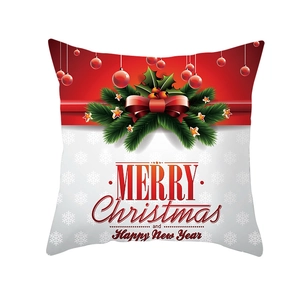 Detail of Nordic Christmas pillowcase showing festive red hanging ornaments and text