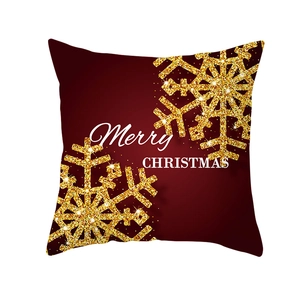 Deep red Christmas pillow cover with golden glitter snowflakes and Merry Christmas text