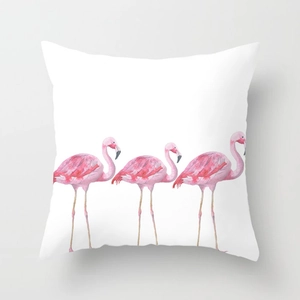 Nordic style pillow case with three pink flamingos in watercolor style on white fabric