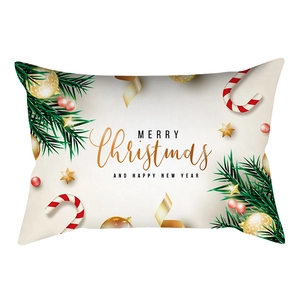 Close-up of Christmas lumbar pillowcase with festive lettering and holiday elements