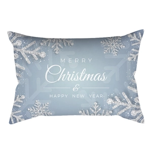 Detailed view of rectangular Christmas lumbar pillow cover with silver snowflake patterns