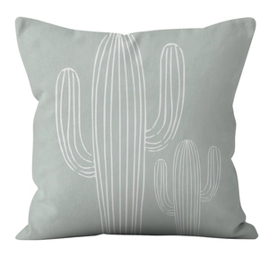 Detail of grey-blue cushion cover with white linear cactus embroidery and fabric texture