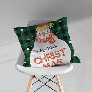 Green and black buffalo plaid Christmas pillow cover featuring a cute snowman design