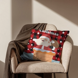 Detail of red and black buffalo plaid Christmas pillow case with Santa Claus print