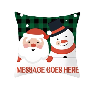 Close-up of Christmas pillow cover featuring Santa and snowman over buffalo plaid pattern