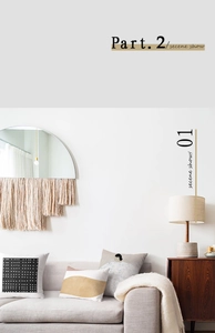 Modern boho wall mirror with semicircular glass and tiered cream macrame fringe detail