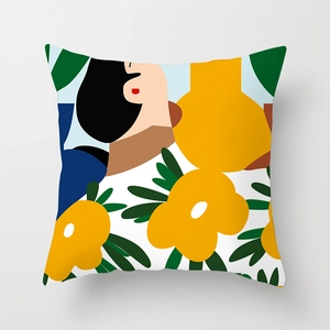 Detail of artistic peach skin pillowcase with abstract female silhouette and yellow flowers
