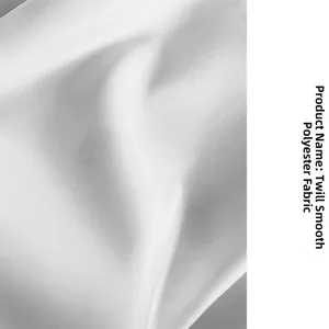 Detail of white twill polyester fabric showing shiny satin texture and weave pattern
