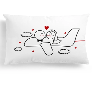 Close-up of white rectangular pillowcase with minimalist cartoon wedding couple design