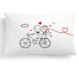 Detailed view of white cushion cover featuring romantic minimalist couple cycling illustration