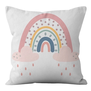Close-up detail of soft rainbow and cloud print on white peach skin fabric pillowcase