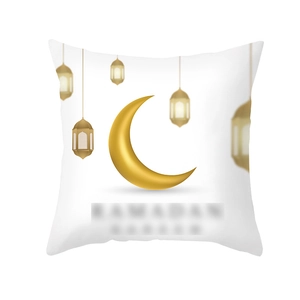 Close-up of golden moon and lantern prints on white Ramadan peach skin cushion cover