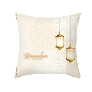 Detail of Ramadan cushion cover with golden lanterns and mandala on cream fabric