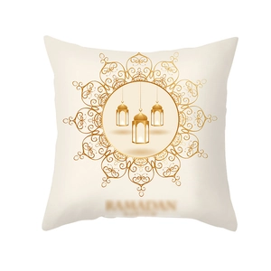 Detail of golden Ramadan mandala print with lanterns on soft cream pillowcase