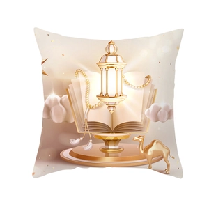 Detail of golden moon pillow cover with camel, lantern and clouds on peach skin fabric