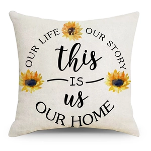 Detailed texture of linen throw pillow cover with sunflowers and family quotes print