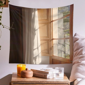 Detailed close-up of fake window tapestry with ocean view and soft sunlight on wall