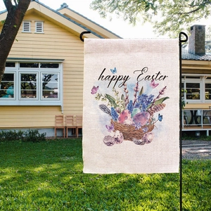 Double-sided Easter garden flag with eggs and flowers in a cozy yard setting
