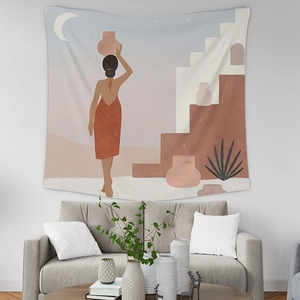Detail of bohemian wall tapestry featuring a woman illustration over a fabric texture