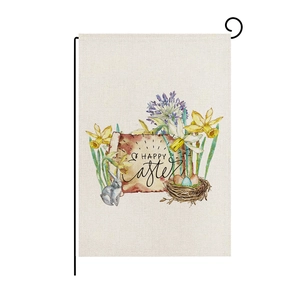 Detail of linen Easter garden flag with bunny, eggs and happy easter text on black metal stand