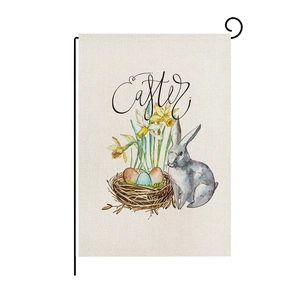 Detail of linen Easter garden flag featuring watercolor rabbit and colorful eggs design
