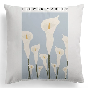 Detail view of the soft peach skin fabric featuring a white calla lily flower market print