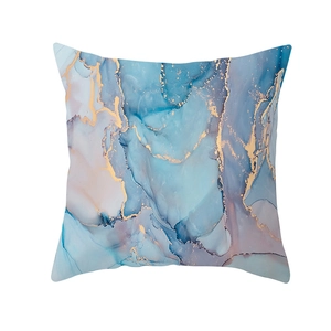 Modern watercolor marble pillowcase with gold veins and peach skin texture in blue and pink