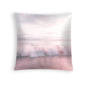Detail of soft peach skin pillowcase with ocean sunset print for home sofa decor