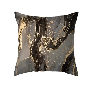 Detailed view of marble pattern pillowcase with gold foil texture and soft velvet fabric