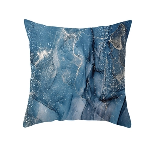 Blue marble texture pillowcase with gold foil accents on a white background