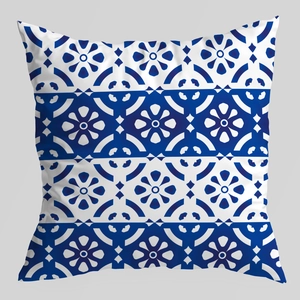 Detailed view of blue and white geometric floral pattern on soft velvet cushion cover