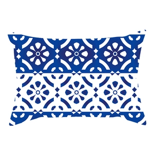 Detail of blue geometric floral pattern on a classic porcelain style pillowcase