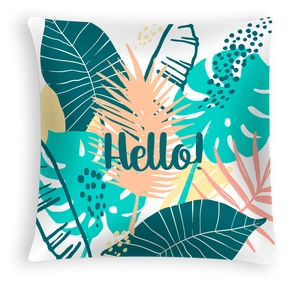 Detail of tropical leaf print pillowcase with monstera pattern and Hello text