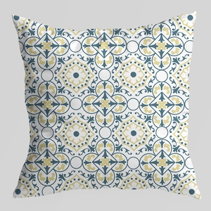 Close-up of Mediterranean geometric floral cushion cover with woven fabric texture