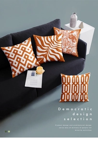 Detail view of orange and grey geometric patterns on high-quality decorative cushion covers
