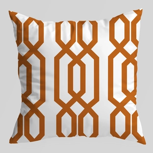 Modern white square pillow cover with orange geometric interlocking patterns on fabric