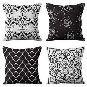 Set of four black and white geometric pattern decorative square pillow covers