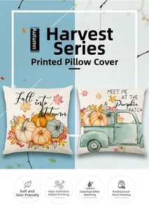 Detail of harvest-themed pumpkin and truck prints on textured linen throw pillow cases