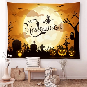 Cozy indoor scene featuring a Halloween moon and witch tapestry on a white wall